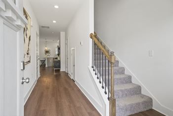 A townhome stairwell at Turnberry Park Luxury Rental Homes in Gardendale, AL